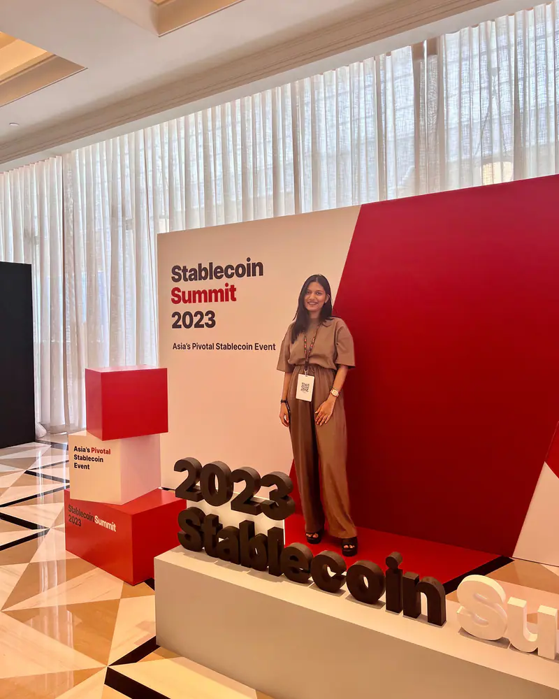 Shilika Jain at the Stablecoin Summit 2023 photo wall